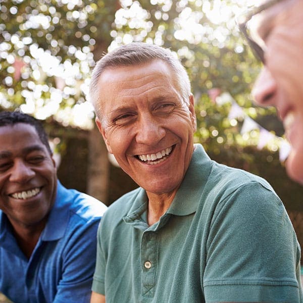 Therapist supporting an adult during trauma-focused counseling