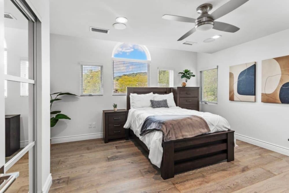 Private bedroom with natural light at a Victory Bay residential mental health facility